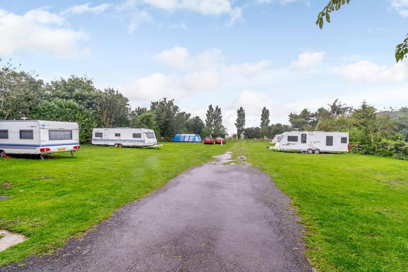 The caravan park is a well-screened and fenced area providing an enclosure for touring caravans, with 37 electric hook-up points. Part of the area has planning permission to accommodate 16 static caravan pitches.