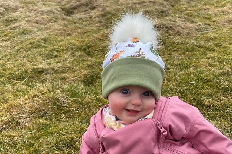 Kirsty Fotheringham's 5-month-old daughter is pictured 'bagging' her first peak - Bishop Hill near Loch Leven.