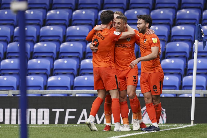 Lee Brown celebrates his first goal with his team-mates.