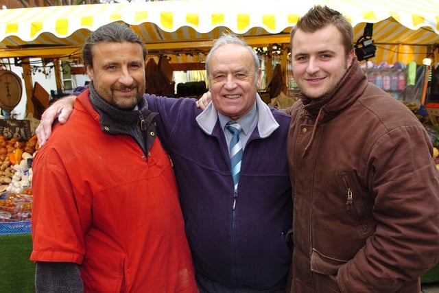 2007. Market traders now placed in Commercial Road Portsmouth. Three of the four generations ¬ (Centre) George Warren (73), with (left) his son Michael (46) and (right) his grandson James (25. Picture: Mallcolm Wells (070151-120)