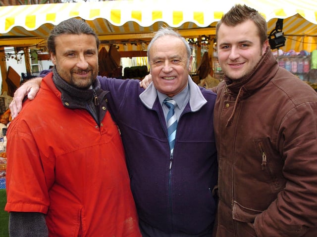 2007. Market traders now placed in Commercial Road Portsmouth. Three of the four generations ¬ (Centre) George Warren (73), with (left) his son Michael (46) and (right) his grandson James (25. Picture: Mallcolm Wells (070151-120)