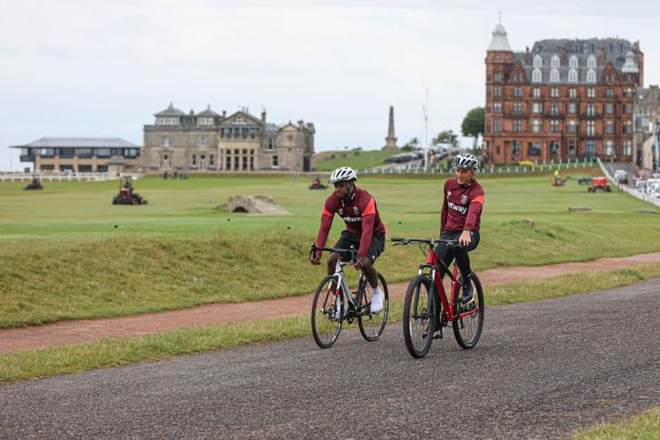 The players cycled around the Old Course.