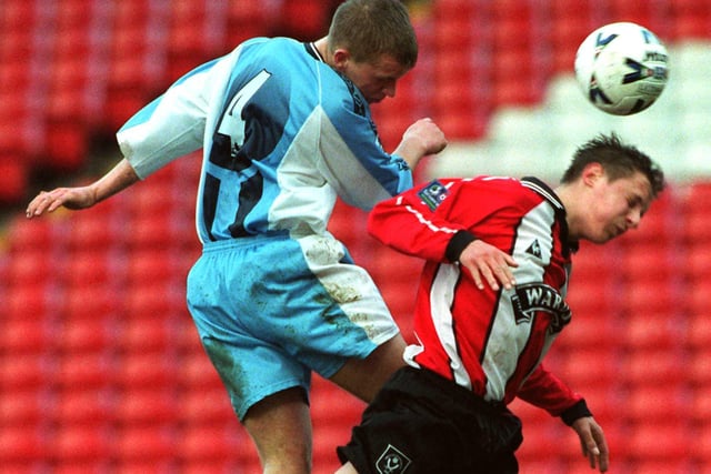 FA Youth Cup 5th Rd. Utd's Phil Jagielka is challenged by City's Craig Pead