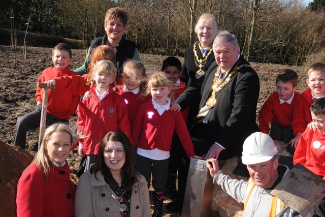 Burying a time capsule in the new development area of Barnes Park are pupils from Barnes Infants school in 2011. Is anyone you know in the picture?