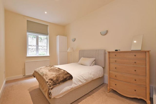 Bedroom number one has a built-in wardrobe and an en-suite, fully tiled shower room.
