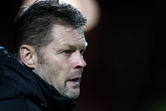 Shrewsbury manager Steve Cotterill has reached out to Darren Moore over their shared fight against Covid-19.