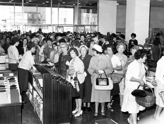 Opening day crowds on the first day of trading at Barker's Pool in 1963.