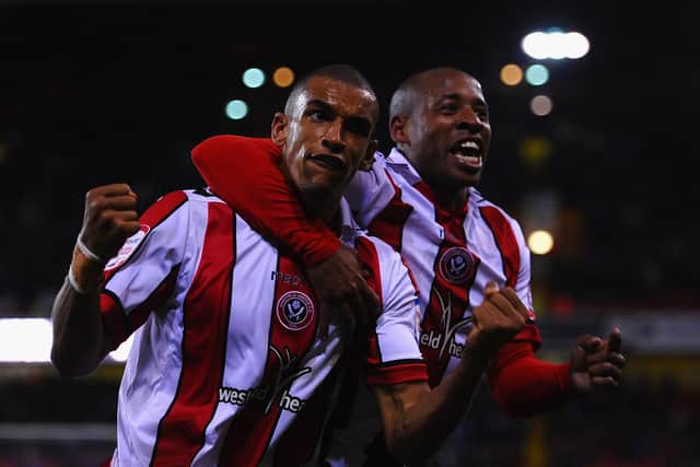 Nick Blackman of Sheffield United is congratulated on scoring by Matt Hill (Photo by Laurence Griffiths/Getty Images)
