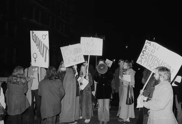 Activists and members of the 'Women's Liberation Movement' protest against the Miss World Beauty Pageant outside the Royal Albert Hall where the contest was held, London, UK, 20th November 1970. (Photo by Pierre Manevy/Daily Express/Hulton Archive/Getty Images)