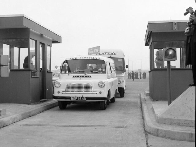 The Scotsman News and Dispatch van crosses the Forth Road Bridge for the first time in 1964.