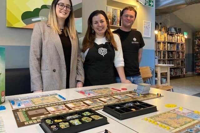 Laura Saul with Ruth and Andy Haigh at The Treehouse Boardgame Cafe on Boston Road in Sheffield. The couple have renewed their lease after welcoming 150,000 customers in their first five years