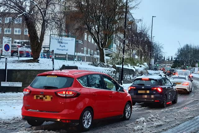 Sheffield is set to see the start of three days of snow this afternoon, according to weather forecasts this morning. PIcture shows snow causing disruption to traffic in the past in the city