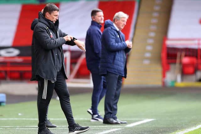 Paul Heckingbottom checks his watch during Sheffield United's defeat by Crystal Palace: Simon Bellis/ Sportimage