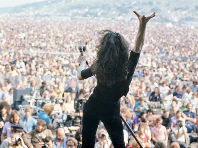 50th Anniversary of the Isle of Wight Festival Celebrated in Landmark Exhibition
Paul Rodgers has the crowd in the palm of his hand. Free perform at the Isle of Wight Music Festival 1970.  Photograph by Charles Everest