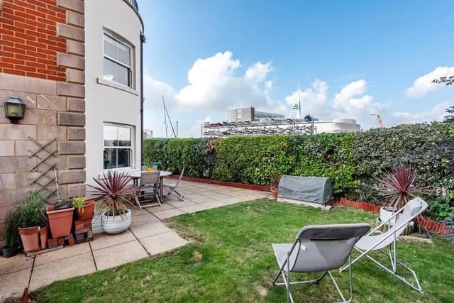 This four bedroom terraced home with views over Camber Dock, Old Portsmouth is on sale for £950,000. Here is the garden and patio area.