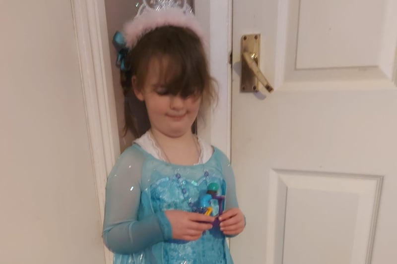 Katherine, age 4, dressed as Elsa from Disney's Frozen.