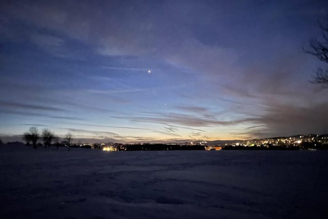 Pictured by reader Laci is the beautiful snow-covered Parson Cross Park at dusk - illuminated by the lights of houses.