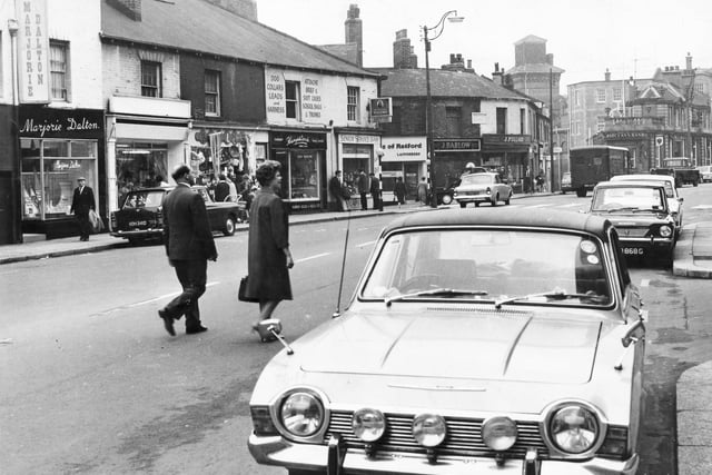 The junction of West Street and Glossop Road, Sheffield, October 9, 1968
Pictured are hairdressers Marjorie Dalton, grocer J Pollard,  Barclays Bank, Ariston Tobacconists, Clarks of Retford and others
