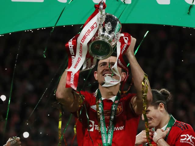 Harry Maguire of Manchester United has had a lot to celebrate through his career - including winning the Carabao Cup trophy on February 26, 2023. Photo: Paul Terry / Sportimage