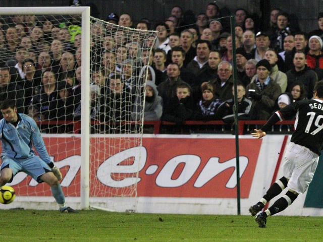 Gareth Seddon scores for Kettering in front of the travelling hordes of Eastwood fans.
