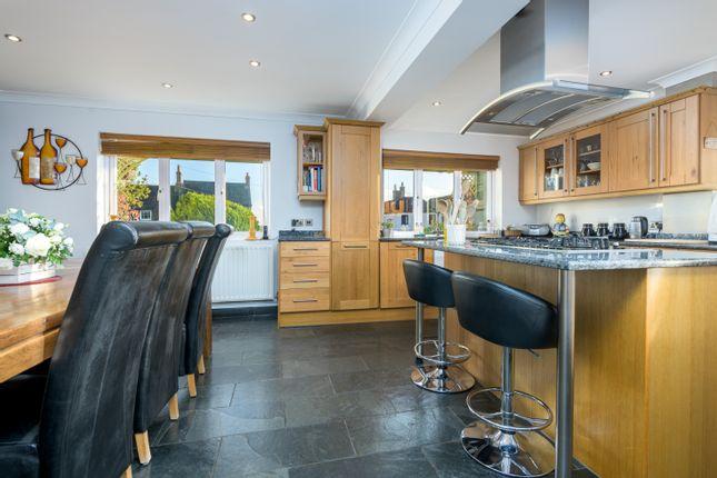 Also located on the ground floor, but in the annex part of the property is another kitchen and dining space.