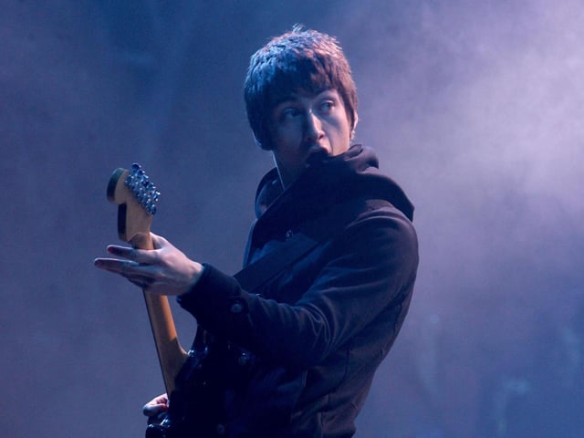 Another shot of Alex Turner in action at Glastonbury 2007