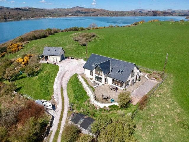 This four Bedroom Beach House is located on the shores of Fleet Bay has access to a quiet and unspoiled beach.