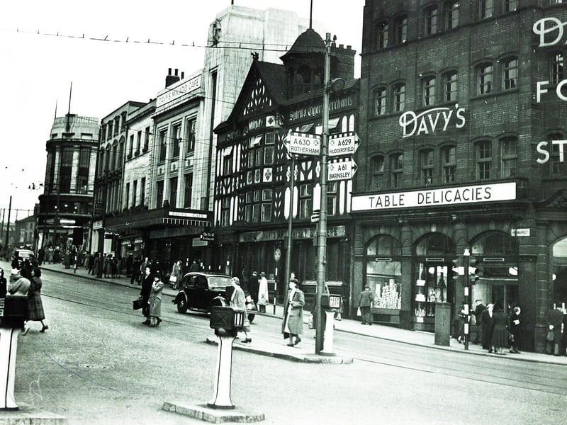 Haymarket - where hay was once bought and sold - is one of Sheffield's oldest thoroughfares. In the fifties, when this picture was taken, it was dominated by Davy's food store, with "The Old No 12" restaurant next door, and beyond it, Davy's Mikado Cafe. Before the war, the Mikado offered an old-style Yorkshire tea, complete with ham or bacon and egg, for 1s 6d. Further along Haymarket can be seen the old Brunswick pub