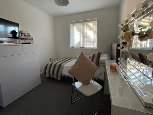 The second bedroom is smaller than the master but, as you can see, it can be turned into a warm setting with character. The uPVC double-glazed window faces the rear.