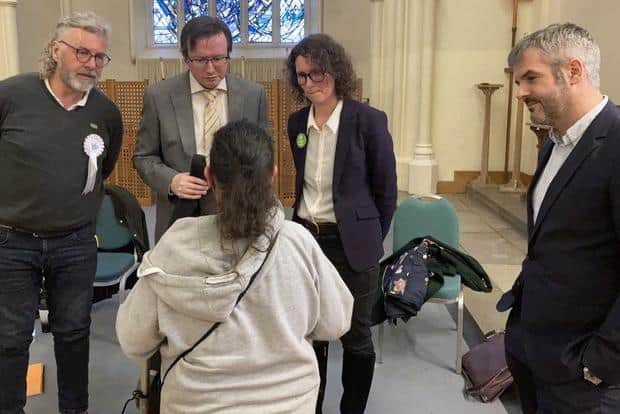 The candidates chat to a resident after the hustings is over. Credit: George Torr/LDRS