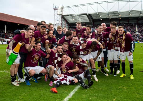 Hearts were crowned Scottish Championship champions the week before they face Queen of the South in 2015.