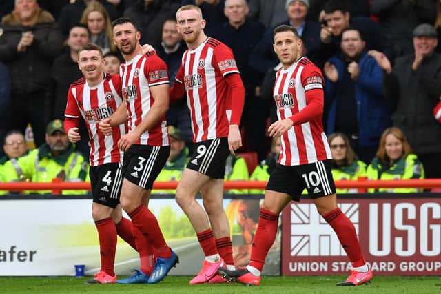 Sheffield United's Irish defender Enda Stevens (2nd L) celebrates with team mates: PAUL ELLIS/AFP via Getty Images