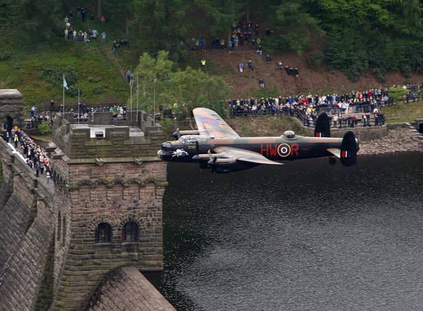 A Lancaster bomber over Derwent dam in the Peak District, to mark the 65th anniversary of the Dambusters raid. A new museum at Derwent to mark the raids has been delayed and could be years away (pic: David Jones/PA Wire)