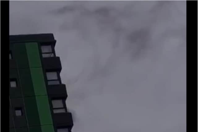 A resident filmed smoke billowing from a high rise tower block in Sheffield this morning after an arson attack