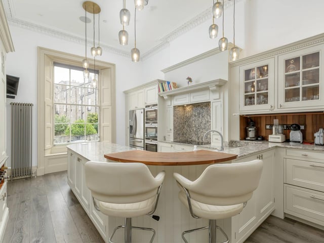 The kitchen includes all manner of features, such as Siemens IQ7 integrated appliances, including main oven, combi microwave/oven, large induction hob and integrated coffee machine. Also included is an American-style fridge freezer with water, ice and soda stream dispenser.
