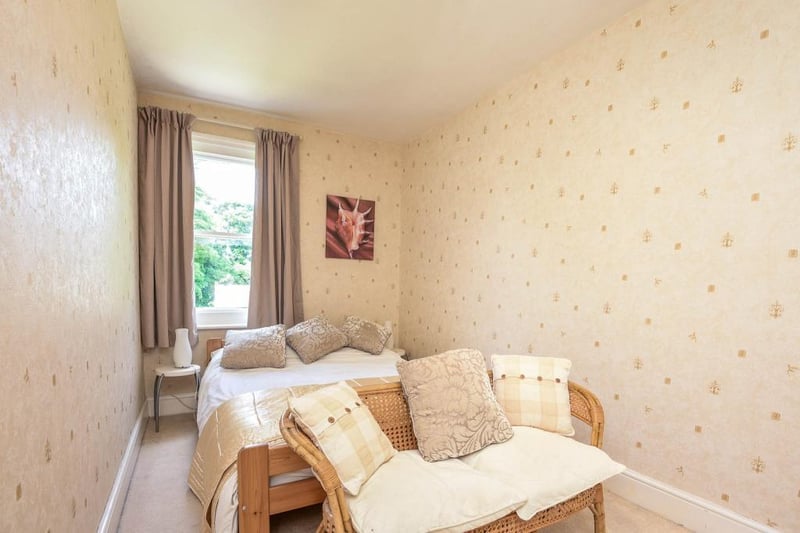 The bedroom offers a view to the rear garden.