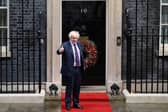 Boris Johnson outside No.10 in December. The Prime Minister is expected to resign today after a number of government resignation over the last 48 hours.