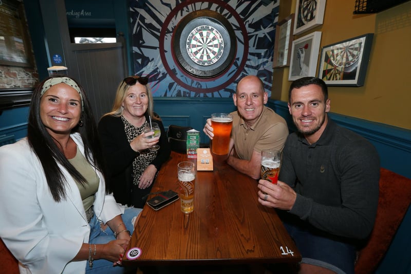 The Turnbull family, from left to right, Nikki, Sharon, Paul and Danny. Fans watch England v Czech Reublic in England's third Group D game of Euro 2020, in The Star & Garter pub, Copnor, Portsmouth. Picture: Chris Moorhouse (jpns 220621-15)