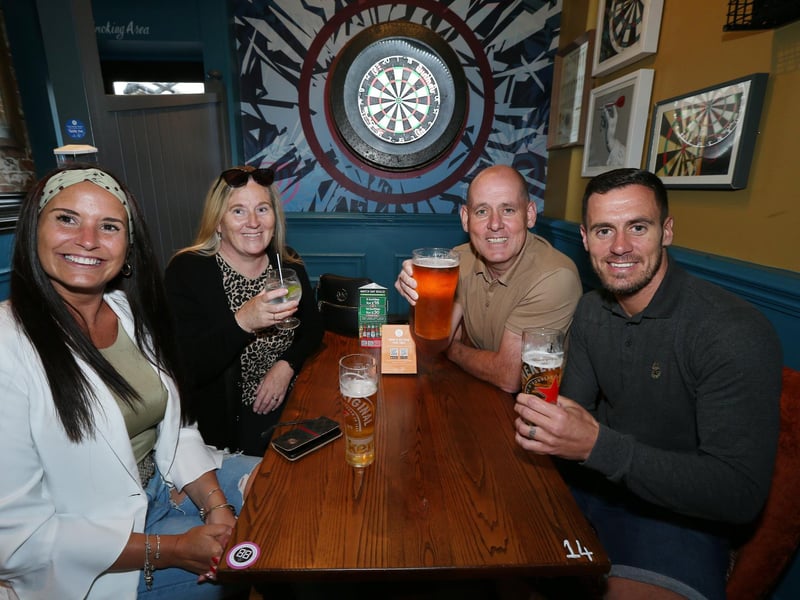The Turnbull family, from left to right, Nikki, Sharon, Paul and Danny. Fans watch England v Czech Reublic in England's third Group D game of Euro 2020, in The Star & Garter pub, Copnor, Portsmouth. Picture: Chris Moorhouse (jpns 220621-15)