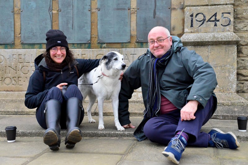 Demi the dog with her owners Gloria Falcone and Rob Harrison.