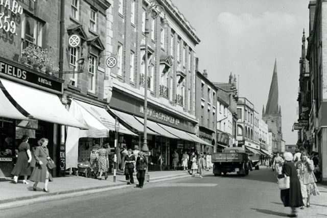 This is the High Street in 1952, already home to familiar names like Marks and Spencer.  Photo from Chesterfield Library.
