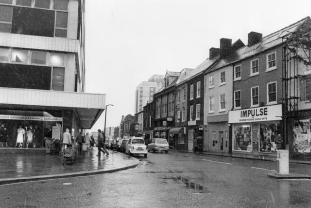 Cambridge Street, Sheffield, in 1984, showing Cole Brothers department store and Impulse, records, posters, cards and gifts shop.