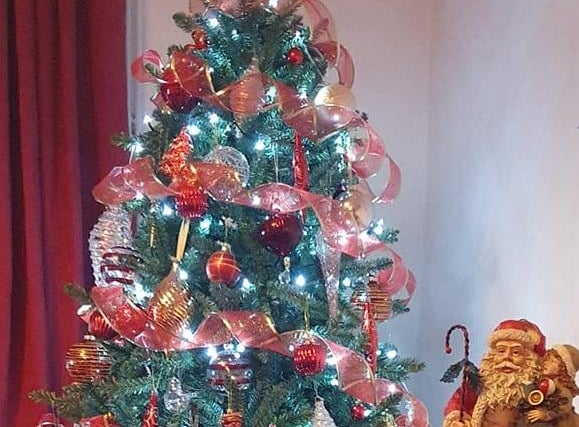 Karen Williamson favours traditional red and gold colours in the decorations on her Christmas tree.