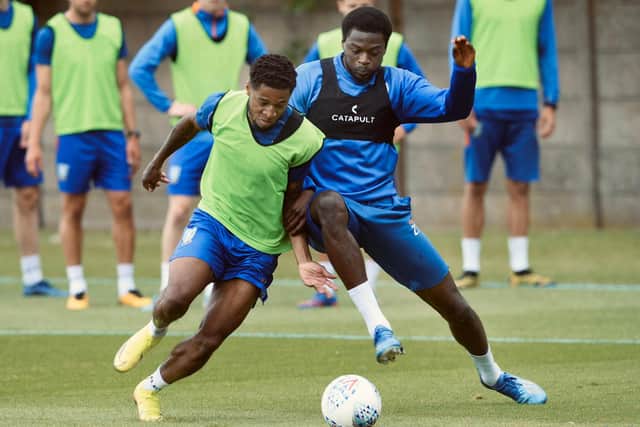 Kadeem Harris (left) has outlined his determination to earn an extended contract at Sheffield Wednesday. (Pic @swfc)