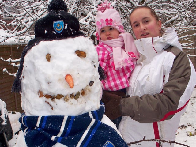 Chloe, 17 months, from Cowplain with her Pompey Snowman.