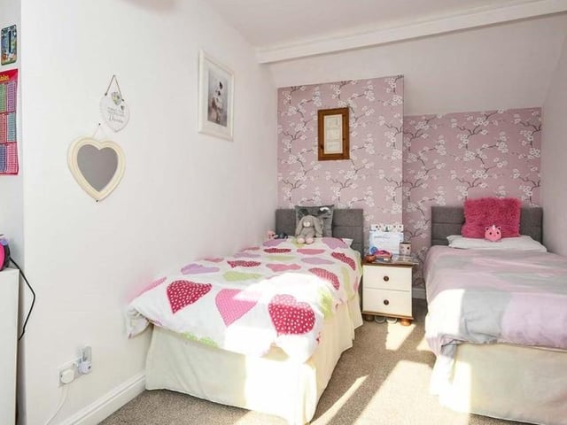Room for two single beds in this room. It is bright, with a touch of character.