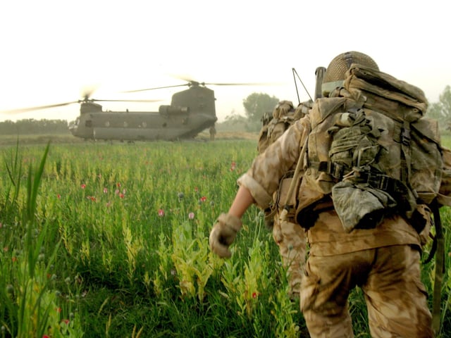 Coldstream Guards in a final push
Soldiers of B multiple, 9 Platoon running up to a Chinook Helicopter for extraction.
3 Company, the 1st Battalion the Coldstream Guards took part in a joint operation with the Afghan National Army in the Babaji area of operations. The task was to dominate the ground in the area south of Patrol Base 3, to disrupt insurgent’s movements as well as engaging with the locals to develop relationships with the local populous.