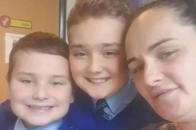 Susan McLoughlin, from Netherton, Liverpool, with her sons Liam and Jake on the last occasion she saw them before she died.