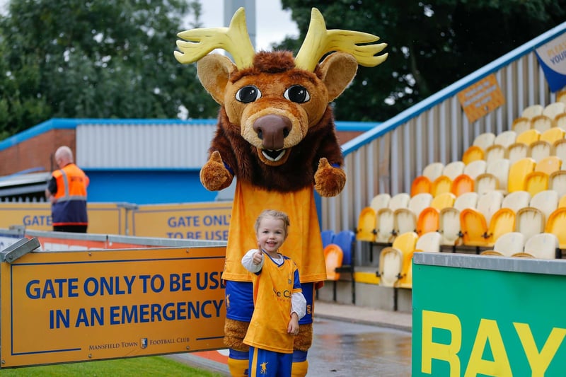 A young Mansfield fan poses with Sammy the Stag!
