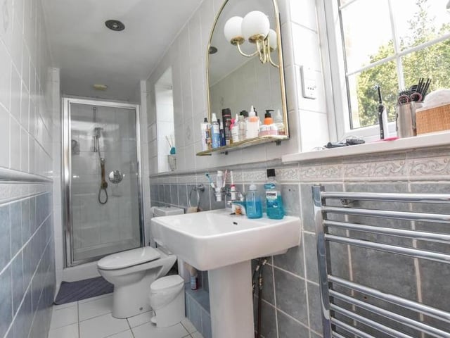 The master bedroom benefits from these en suite facilities. They include a walk-in shower cubicle, wash hand basin, WC and heated towel-rail.
